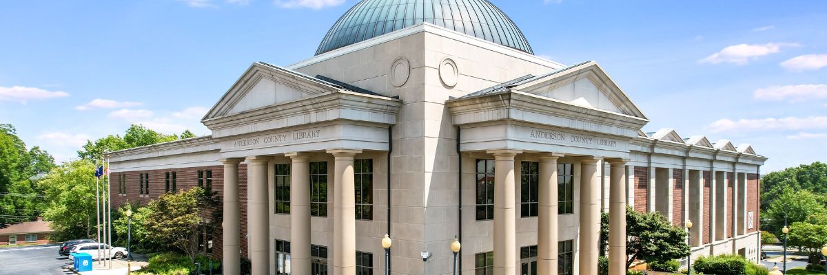 Corner angle photo of Anderson Main Library building, including columns, pediments, and dome 