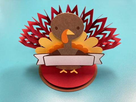 placecard for a table in the shape of a paper turkey