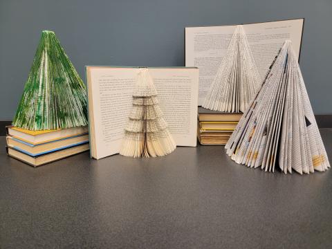 several trees made from books