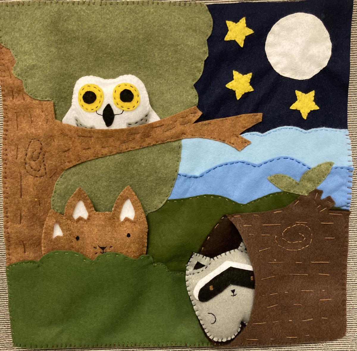 felt animals in a woodland scene