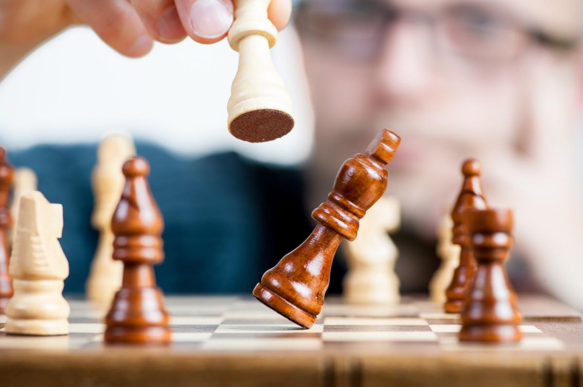 chess board with bishop in forefront