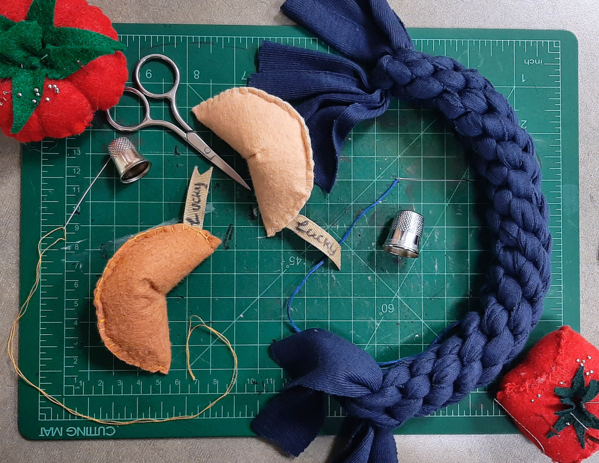 two handmade pet toys, one for cats and one for dogs. 